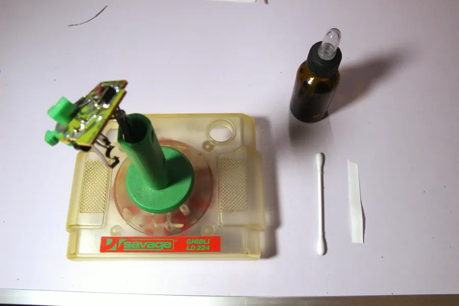 cleaning the top button