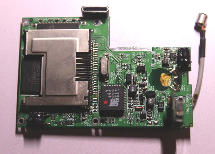 New capacitors soldered onto the circuit board